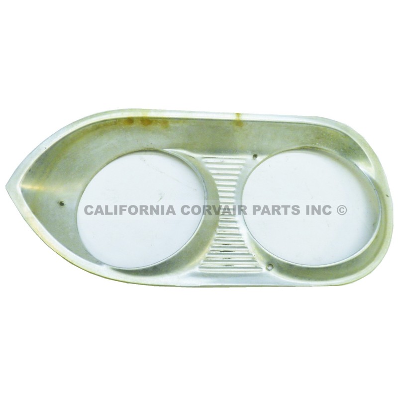 USED 1965 HEADLIGHT BEZEL - LEFT SIDE